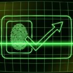 Green CRT illustration of fingerprint scan with verification checkmark