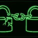 Two green wireframe padlocks joined by a snapped chain